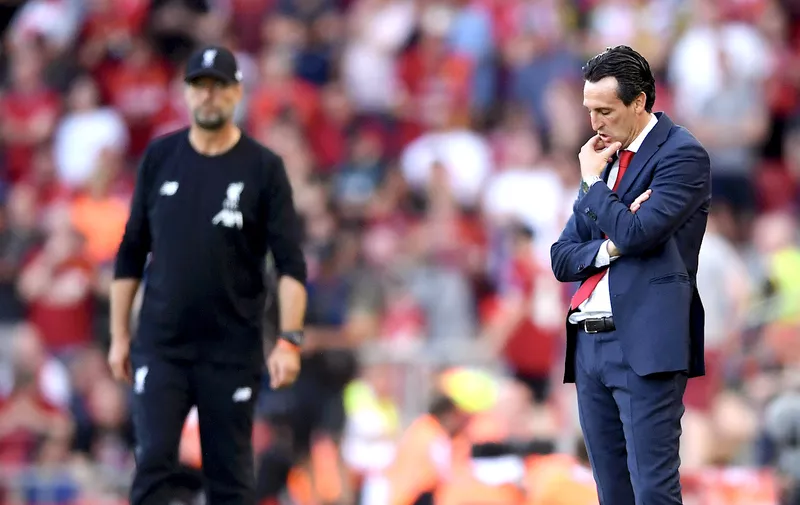 LIVERPOOL, ENGLAND - AUGUST 24: Unai Emery, Manager of Arsenal looks dejected in the final minutes of the Premier League match between Liverpool FC and Arsenal FC at Anfield on August 24, 2019 in Liverpool, United Kingdom. (Photo by Laurence Griffiths/Getty Images)