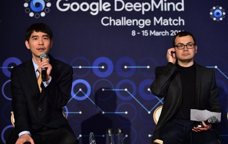 Lee Se-Dol (L), one of the greatest modern players of the ancient board game Go, speaks as Google Deepmind head Demis Hassabis (R) listens during a post-match press conference after the fifth and final game of the Google DeepMind Challenge Match against Google-developed supercomputer AlphaGo at a hotel in Seoul on March 15, 2016.
A Google-developed computer programme had the last word in its machine vs human challenge with South Korean Go grandmaster Lee Se-Dol, winning the final game for a sweeping 4-1 series victory. / AFP / JUNG Yeon-Je