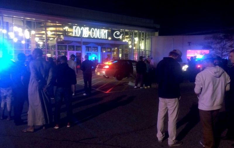 This image from video provided by KSTP 5 television in Minneapolis, Minnesota, shows people standing outside the scene of a stabbing at the Crossroads Center mall in St. Cloud, Minnesota.
A man making "some references to Allah" stabbed and injured eight people September 17, 2016 in a shopping mall in the US state of Minnesota, before being shot dead by an off-duty officer, police said. The suspect "asked at least one person if they were Muslim before he assaulted them," Blair Anderson, the police chief in the city of St. Cloud where the attack took place, told journalists. Anderson said the armed suspect entered the Crossroads Center mall in St. Cloud -- a city of about 67,000 people some 70 miles (110 km) northwest of Minneapolis -- and attacked at least eight people.
 / AFP PHOTO / KSTP TV / HO / RESTRICTED TO EDITORIAL USE - MANDATORY CREDIT "AFP PHOTO /KSTP 5 TELEVISION" - NO MARKETING NO ADVERTISING CAMPAIGNS - DISTRIBUTED AS A SERVICE TO CLIENTS == NO ARCHIVE ==NO SALES==  MINNEAPOLIS-ST.PAUL NEWS SOURCES OUT ==