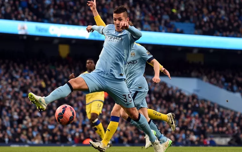 Manchester City's Montenegrin striker Stevan Jovetic beats Sheffield Wednesday's English goalkeeper Chris Kirkland (not pictured) but is called offside during the English FA Cup third round football match between Manchester City and Sheffield Wednesday at The Etihad Stadium in Manchester, north west England on January 4, 2015. AFP PHOTO / PAUL ELLIS

RESTRICTED TO EDITORIAL USE. No use with unauthorized audio, video, data, fixture lists, club/league logos or live services. Online in-match use limited to 45 images, no video emulation. No use in betting, games or single club/league/player publications.