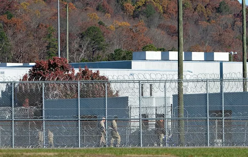 BUTNER, NC - NOVEMBER 20: The fence around the federal prison in Butner, North Carolina where convicted Israel spy Jonathan Pollard was released from is seen on November 20, 2015 in Butner, North Carolina. Pollard, 61, spent 30 years in prison after being caught selling American intelligence secrets to Israel. The prison camp houses three levels of security on the multi-building Federal Correctional Institute campus.   Sara D. Davis/Getty Images/AFP