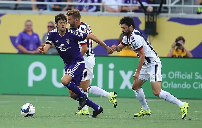 ORLANDO, FL - JULY 15: Kaka #10 of Orlando City SC challenges James Morrison #7 of West Bromwich Albion for the ball during an International friendly soccer match between West Bromwich Albion and the Orlando City SC at the Orlando Citrus Bowl on July 15, 2015 in Orlando, Florida. Orlando won the match 3-1.   Alex Menendez/Getty Images/AFP