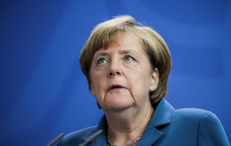 German Chancellor Angela Merkel (CDU) makes a statement on the shootings in Munich at the federal chancellery in Berlin, Germany, 23 July 2016. An 18-year-old German-Iranian had killed nine people and himself in Munich on Friday evening. The background and motive of the attack remain unclear. Photo: Michael Kappeler/dpa