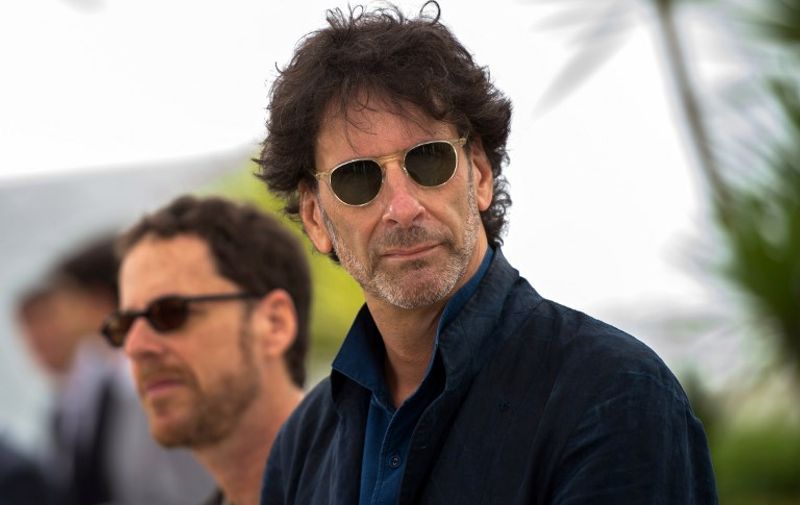 US directors and Presidents of the Feature Film jury Joel Coen (R) and Ethan Coen pose during a photocall ahead of the opening of the 68th Cannes Film Festival in Cannes, southeastern France, on May 13, 2015.  AFP PHOTO / LOIC VENANCE / AFP PHOTO / LOIC VENANCE