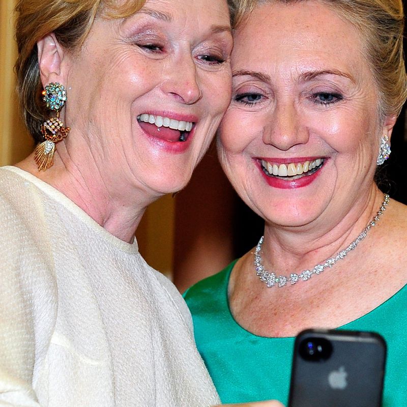 WASHINGTON, DC - DECEMBER 1:  Meryl Streep takes a photo of herself with U.S. Secretary of State Hillary Clinton following a dinner for Kennedy honorees hosted by U.S. Secretary of State Hillary Rodham Clinton at the U.S. Department of State on December 1, 2012 in Washington, DC. The 2012 honorees are Buddy Guy, actor Dustin Hoffman, late-night host David Letterman, dancer Natalia Makarova, and members of the British rock band Led Zeppelin Robert Plant, Jimmy Page, and John Paul Jones. (Photo by Ron Sachs - Pool/Getty Images)