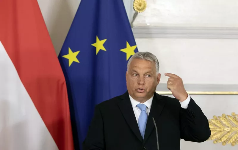 Hungarian Prime Minister Viktor Orban gestures as he addresses a press conference after the Migration Summit in Vienna on July 7, 2023. (Photo by Alex HALADA / AFP)