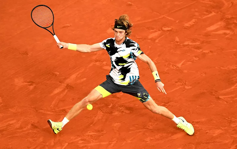 PARIS, FRANCE - OCTOBER 07: Andrey Rublev of Russia plays a forehand during his Men's Singles quarterfinals match against Stefanos Tsitsipas of Greece on day eleven of the 2020 French Open at Roland Garros on October 07, 2020 in Paris, France. (Photo by Shaun Botterill/Getty Images)