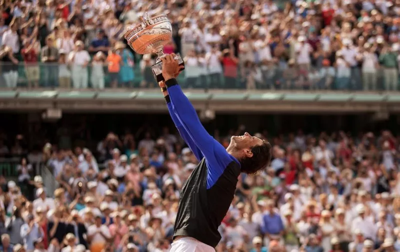Jun 11, 2017; Paris, France; Rafael Nadal (ESP) hold his 10th French Open trophy aloft at the trophy presentation after his match against Stanislas Wawrinka (SUI) (not pictured) on day fifteen of the 2017 French Open tennis tournament at Stade Roland Garros., Image: 336320456, License: Rights-managed, Restrictions: *** World Rights ***, Model Release: no, Credit [&hellip;]