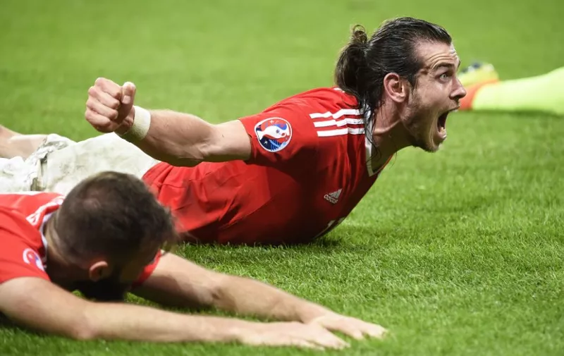 Forward Gareth Bale of Wales celebrates the victory of his team at the end of the UEFA Euro 2016, Quarter Final football match between Wales and Belgium on July 01, 2016 at Pierre Mauroy stadium in Lille Métropole, France - Photo Jean-Marie Hervio / Regamedia / DPPI