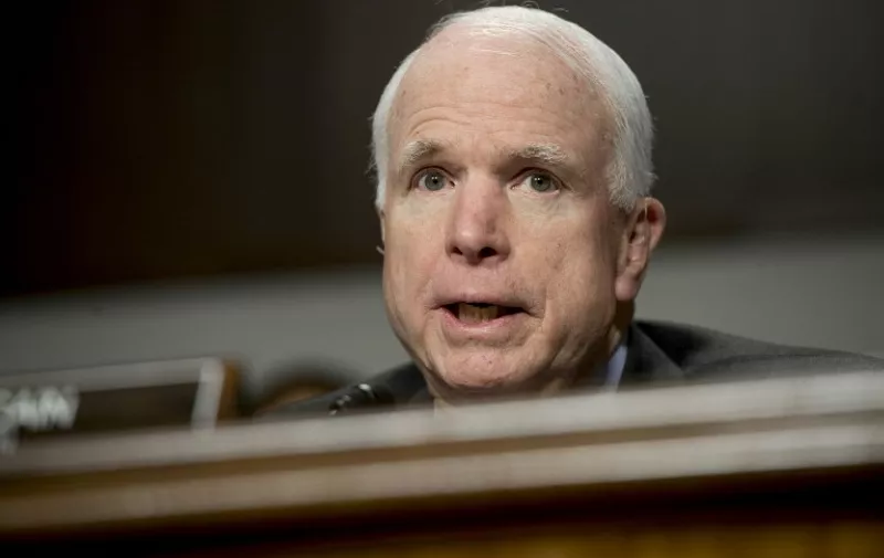 (FILES) This file photo taken on February 9, 2016 shows US Senator John McCain, Republican of Arizona and chairman of the Senate Armed Services Committee, speaking during a hearing on Capitol Hill in Washington, DC.
Republican Senator John McCain slammed Donald Trump on August 1, 2016 for disparaging the Muslim family of a slain American soldier, and demanded that his party's presidential candidate set an example for the country.
 / AFP PHOTO / Saul LOEB