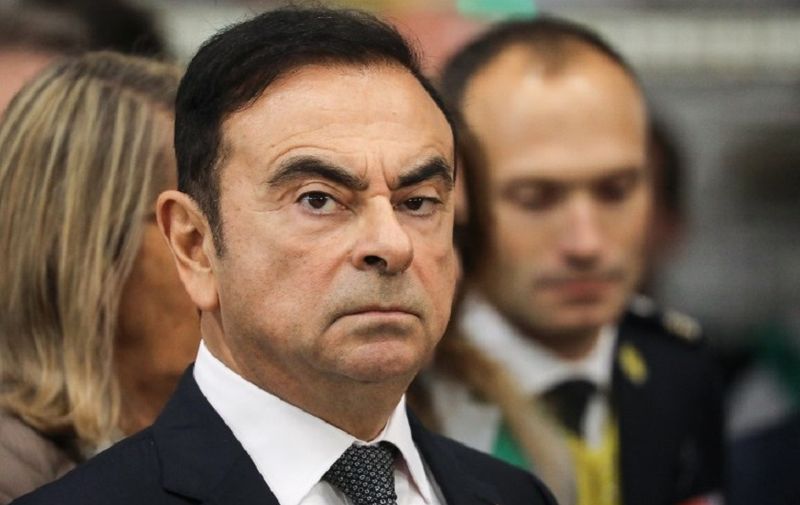 Chairman and CEO of Renault-Nissan-Mitsubishi Carlos Ghosn looks on during a visit of French President at the Renault factory, in Maubeuge, northern France, on November 8, 2018. - Macron is on a week-long tour to visit the most iconic French landmarks of the First World War, ahead of celebrations for the 100th anniversary of the November 11, 1918 armistice. (Photo by Ludovic MARIN / AFP)