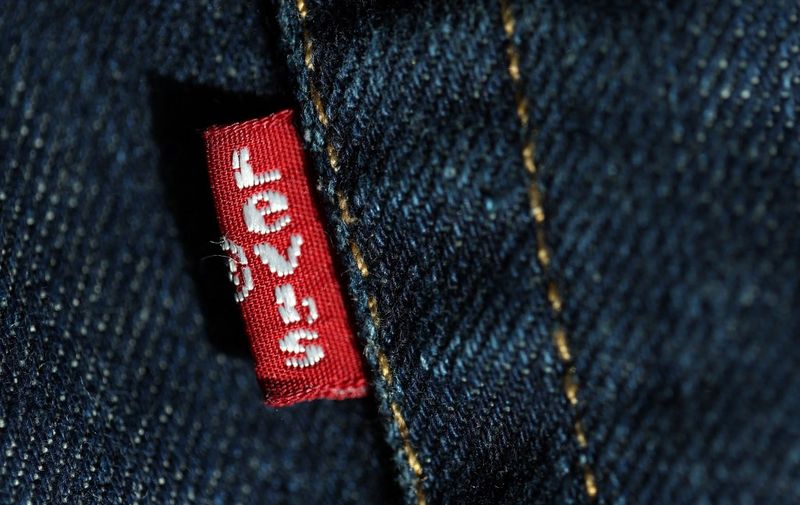 SAN ANSELMO, CALIFORNIA - APRIL 06: In this photo illustration, a logo is displayed on a pair of Levi's jeans on April 06, 2023 in San Anselmo, California. San Francisco-based Levi Strauss &amp; Co. reported better-than-expected first quarter earnings with net income of $114.7 million (Photo Illustration by Justin Sullivan/Getty Images) (Photo by JUSTIN SULLIVAN / GETTY IMAGES NORTH AMERICA / Getty Images via AFP)