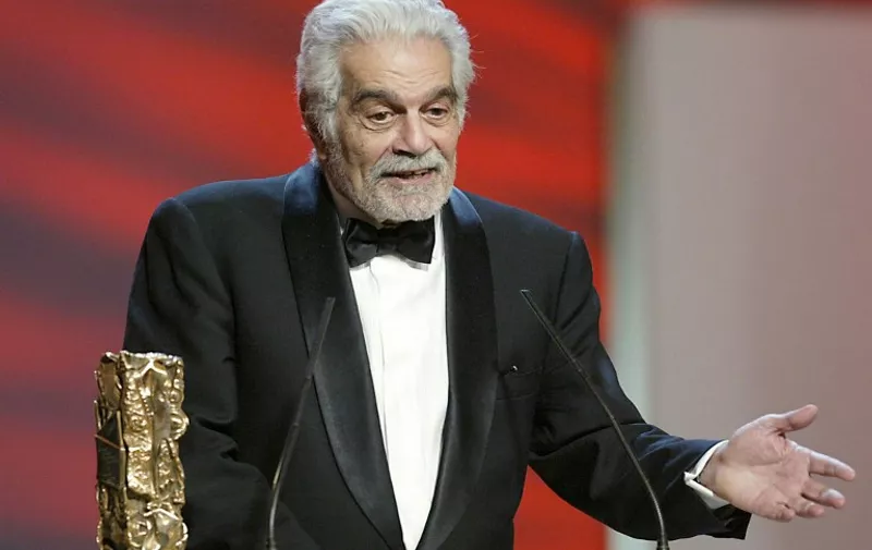 Egyptian born actor Omar Sharif speaks after he was awarded as Best actor of the year during the 29th Nuit des Cesars at the Chatelet theatre in Paris 21 February 2004. AFP PHOTO JEAN-LOUP GAUTREAU