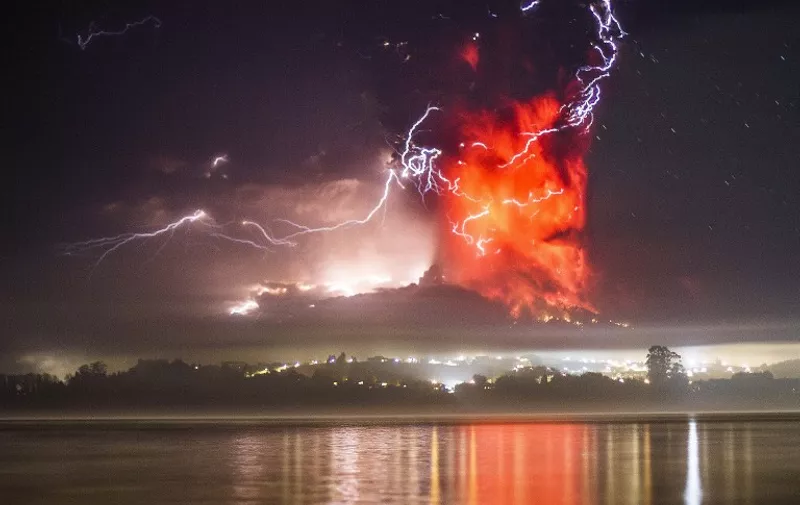 This view from Puerto Varas, southern Chile, shows a high column of ash and lava spewing from the Calbuco volcano, on April 23, 2015. Chile&#8217;s Calbuco volcano erupted on Wednesday, spewing a giant funnel of ash high into the sky near the southern port city of Puerto Montt and triggering a red alert. Authorities ordered [&hellip;]