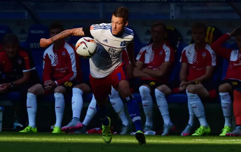 Hamburg's Croatian midfielder Ivo Ilicevic controls the ball during the German first division Bundesliga football match Hamburger SV vs VfB Stuttgart, on August 22, 2015 in Hamburg, northern Germany.  Hamburg wins 3-2. AFP PHOTO / JOHN MACDOUGALL

RESTRICTIONS: DURING MATCH TIME: DFL RULES TO LIMIT THE ONLINE USAGE TO 15 PICTURES PER MATCH AND FORBID IMAGE SEQUENCES TO SIMULATE VIDEO. 
== RESTRICTED TO EDITORIAL USE == FOR FURTHER QUERIES PLEASE CONTACT DFL DIRECTLY AT + 49 69 650050. / AFP / JOHN MACDOUGALL