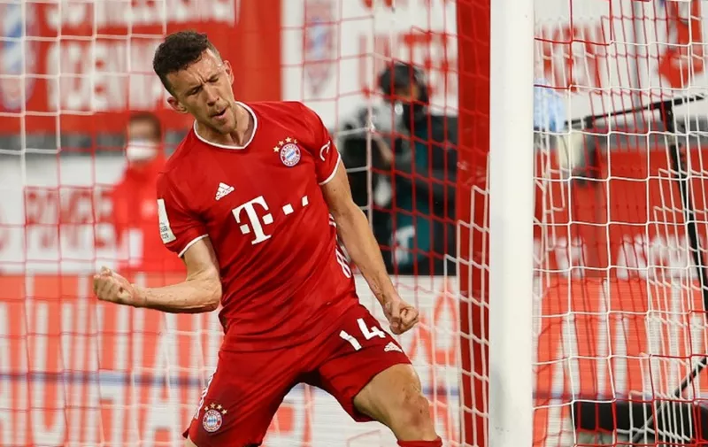 Bayern Munich's Croatian midfielder Ivan Perisic celebrates scoring the opening goal during the German Cup (DFB Pokal) semi-final football match FC Bayern Munich v Eintracht Frankfurt in Munich, southern Germany on June 10, 2020. (Photo by Kai PFAFFENBACH / POOL / AFP) / DFB REGULATIONS PROHIBIT ANY USE OF PHOTOGRAPHS AS IMAGE SEQUENCES AND QUASI-VIDEO.