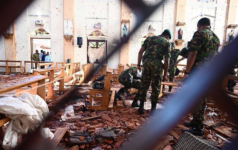 Security personnel inspect the interior of St Sebastian's Church in Negombo on April 22, 2019, a day after the church was hit in series of bomb blasts targeting churches and luxury hotels in Sri Lanka. At least 290 are now known to have died in a series of bomb blasts that tore through churches and luxury hotels in Sri Lanka, in the worst violence to hit the island since its devastating civil war ended a decade ago., Image: 427372140, License: Rights-managed, Restrictions: , Model Release: no, Credit line: Profimedia, AFP