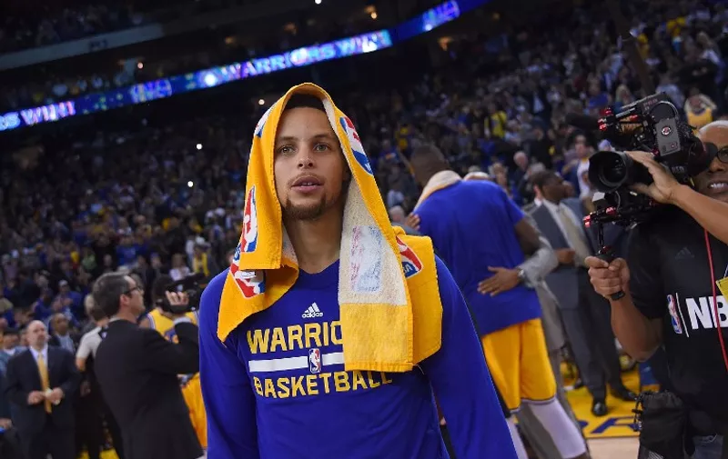OAKLAND, CA - NOVEMBER 24: #30 of the Golden State Warriors looks on after they defeated the Los Angeles Lakers 111-77 to start the season 16-0 at ORACLE Arena on November 24, 2015 in Oakland, California. NOTE TO USER: User expressly acknowledges and agrees that, by downloading and or using this photograph, User is consenting to the terms and conditions of the Getty Images License Agreement.   Thearon W. Henderson/Getty Images/AFP