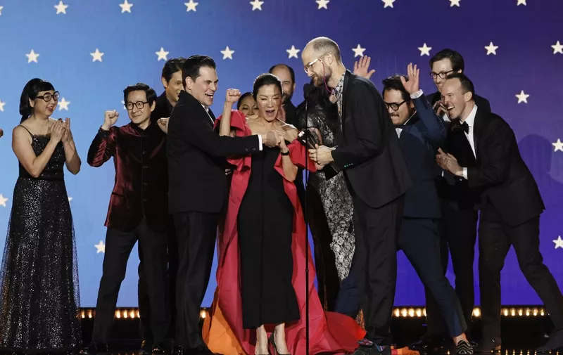 LOS ANGELES, CALIFORNIA - JANUARY 15: (L-R) Shirley Kurata, Ke Huy Quan, Harry Shum Jr., Jonathan Wang, Michelle Yeoh, Daniel Scheinert, Daniel Kwan, Zak Stoltz, and Jon Read accept the Best Picture award for "Everything Everywhere All at Once" onstage during the 28th Annual Critics Choice Awards at Fairmont Century Plaza on January 15, 2023 in Los Angeles, California.   