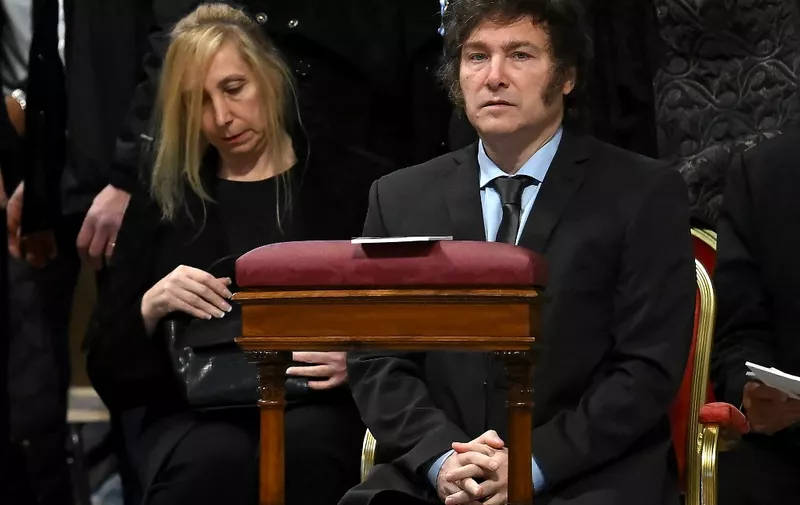 Argentina's President Javier Milei (R) flanked by his sister Karina Elizabeth Milei (L) attend prior to Pope Francis  presides over Holy Mass and canonisation of Blessed Maria Antonia of Saint Joseph de Paz y Figueroa at the Vatican on February 11, 2024. (Photo by Filippo MONTEFORTE / AFP)