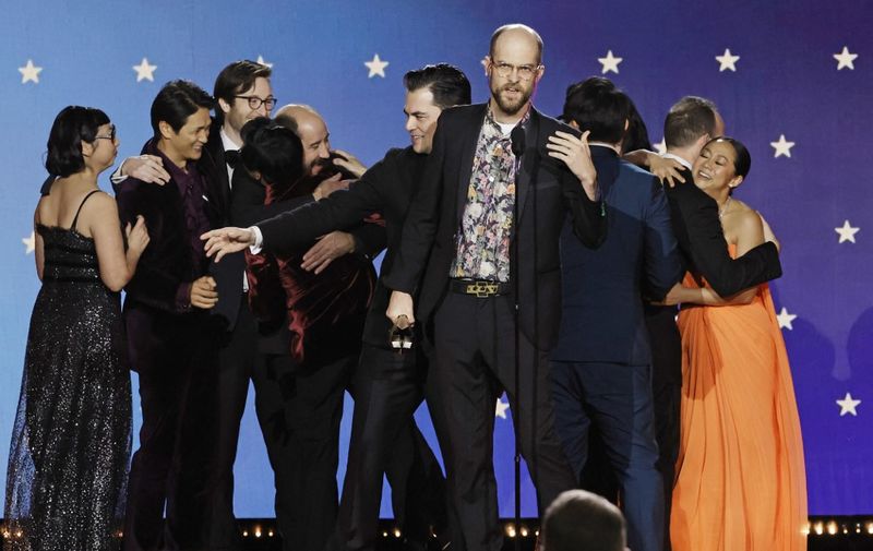 LOS ANGELES, CALIFORNIA - JANUARY 15: (L-R) Shirley Kurata, Harry Shum Jr., Zak Stoltz, Ke Huy Quan, Paul Rogers, Jonathan Wang, Daniel Scheinert, Daniel Kwan, Jon Read, and Stephanie Hsu accept the Best Picture award for "Everything Everywhere All at Once" onstage during the 28th Annual Critics Choice Awards at Fairmont Century Plaza on January 15, 2023 in Los Angeles, California.   Kevin Winter/Getty Images for Critics Choice Association/AFP (Photo by KEVIN WINTER / GETTY IMAGES NORTH AMERICA / Getty Images via AFP)