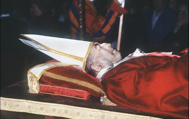 (FILES) This file photo taken early October 1978 shows the body of Pope John Paul I exposed after his death on September 28, 1978 in The Vatican. - Pope Francis will preside on September 4, 2022 over the beatification of John Paul I, the so-called "Smiling Pope" who led the Catholic Church for just 33 days before dying in contested circumstances. (Photo by AFP)