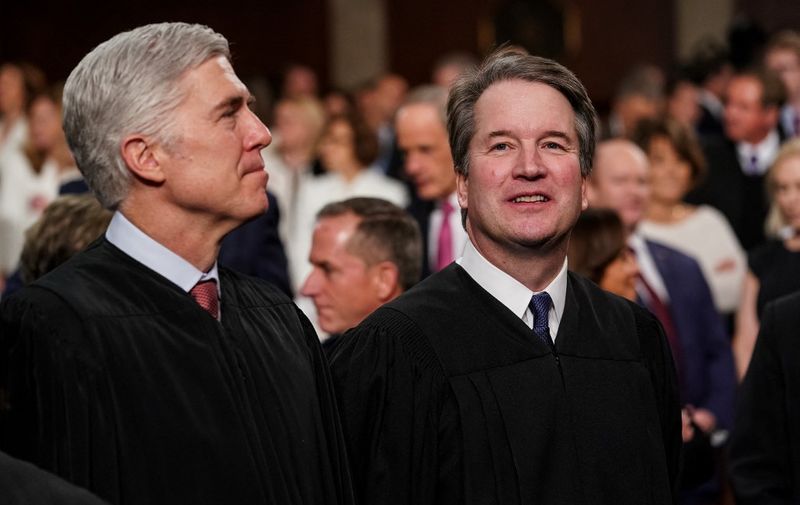 Supreme Court Neil Gorsuch (L) and Brett Kavanaugh attend the State of the Union address at the Capitol in Washington, DC on February 5, 2019. (Photo by Doug Mills / POOL / AFP)