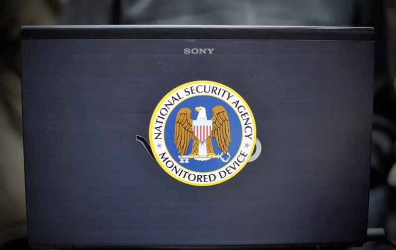 A sticker which reads 'National Security Agency - Monitored Device' is seen on a laptop of a participant of the re:publica internet conference in Berlin, Germany, 08 May 2014. Lectures surrounding the topic internet were held bewteen 06 May and 08 May 2014. Photo: OLE SPATA/dpa