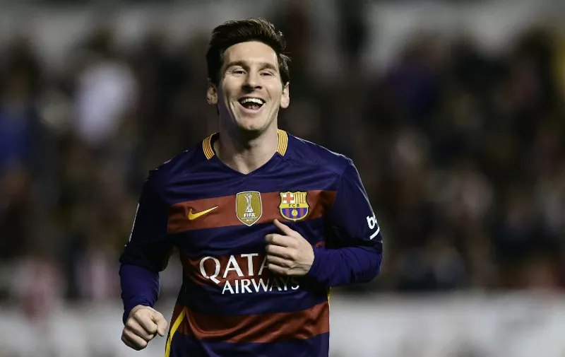 Barcelona's Argentinian forward Lionel Messi celebrates after scoring during the Spanish league football match CF Rayo Vallecano vs FC Barcelona at the Vallecas stadium in Madrid on March 3, 2016. / AFP / PIERRE-PHILIPPE MARCOU