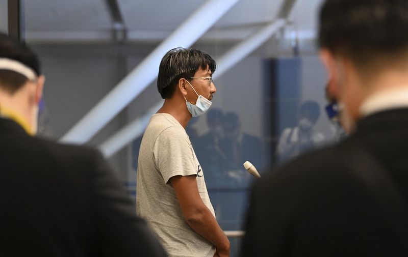 Japanese journalist Yuki Kitazumi, who was arrested by security forces while covering the aftermath of the Myanmar coup, speaks to the media upon his arrival at Narita Airport in Narita, Chiba prefecture on May 14, 2021, after charges against him were dropped as a diplomatic gesture. (Photo by Kazuhiro NOGI / AFP)