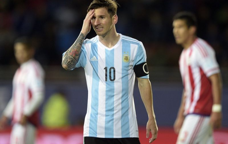 Argentina's forward Lionel Messi reacts during their 2015 Copa America football championship match against Paraguay, in La Serena, on June 13, 2015.  AFP PHOTO / JUAN MABROMATA