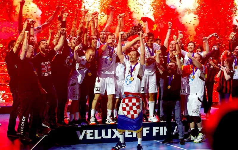 COLOGNE, GERMANY &#8211; JUNE 02: Team members of Vardar celebrate with the trophy after winning the VELUX EHF Champions League final match between HC Vardar and Telekom Veszprem HC at Lanxess Arena on June 02, 2019 in Cologne, Germany. (Photo by Juergen Schwarz/Getty Images)