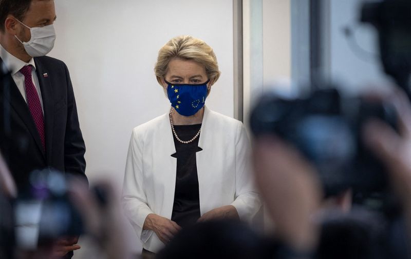 European Commission President Ursula von der Leyen wears a face mask in EU design as she visits the Comenius University Science Park in Bratislava, Slovakia on June 21, 2021. (Photo by TOMAS BENEDIKOVIC / AFP)