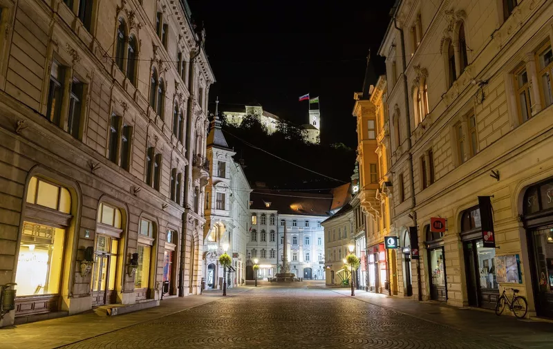 A view of an empty old city center during an overnight curfew.
After re declaring an epidemic Slovenia imposed a nationwide overnight curfew to fight its surge of coronavirus infections. Itís the first time a curfew was declared in Slovenia since the start of the outbreak. The curfew is in place from 21:00 to 6:00.
Overnight curfew in Ljubljana, Slovenia - 20 Oct 2020,Image: 564761889, License: Rights-managed, Restrictions: , Model Release: no