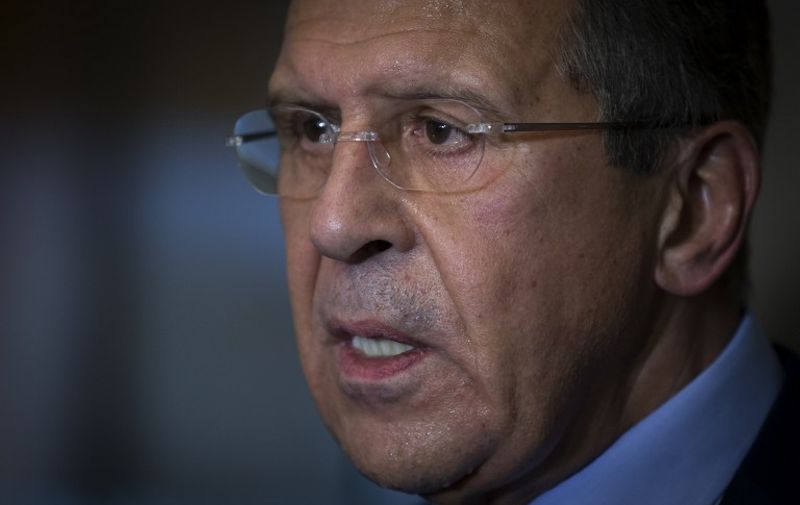 Foreign Minister for Russia Sergey Lavrov speaks to journalists following a day of meetings to discuss the Syrian conflict with Foreign ministers of US, Turkey, Russia and Saudi Arabia in Vienna, on October 23, 2015.
AFP PHOTO / POOL / CARLO ALLEGRI