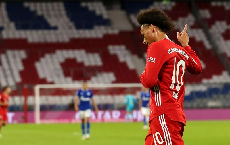 MUNICH, GERMANY - SEPTEMBER 18:  Leroy Sane of Bayern Munich celebrates after he scores his teams seventh goal during the Bundesliga match between FC Bayern Muenchen and FC Schalke 04 at Allianz Arena on September 18, 2020 in Munich, Germany. Fans are set to return to Bundesliga stadiums in Germany despite to the ongoing Coronavirus Pandemic. Up to 20% of stadium's capacity are allowed to be filled. Final decisions are left to local health authorities and are subject to club's hygiene concepts and the infection numbers in the corresponding region. The match in Munich is played behind closed doors due to the high number of new Covid-19 cases in the city of Munich. (Photo by Alexander Hassenstein/Getty Images)