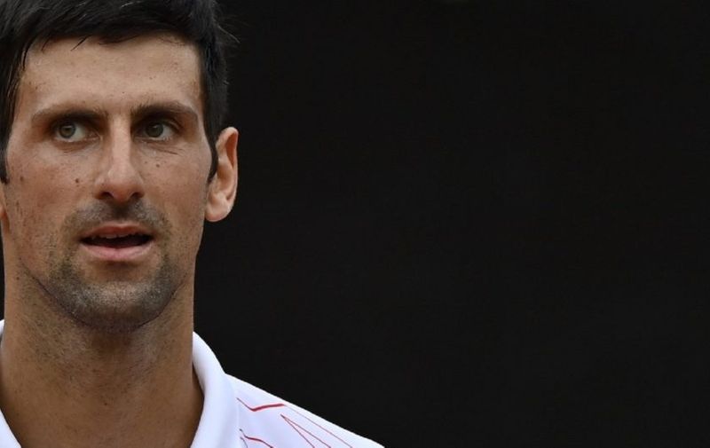 Serbia's Novak Djokovic looks on after winning his quarter final match of the Men's Italian Open against Germany's Dominik Koepfer at Foro Italico on September 19, 2020 in Rome, Italy. (Photo by Riccardo Antimiani / POOL / AFP)