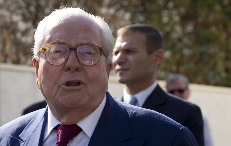 French far-right National Front (FN) party founder and honorary President Jean-Marie Le Pen leaves the party's headquarters in Nanterre, near Paris, on August 20, 2015 after a meeting to decide whether he would be excluded from the party.  AFP PHOTO / KENZO TRIBOUILLARD