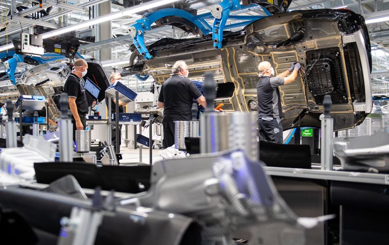 SINDELFINGEN, GERMANY - SEPTEMBER 02: Workers assemble the new S-Class Mercedes-Benz passenger car at the new "Factory 56" assembly line at the Mercedes-Benz manufacturing plant on September 2, 2020 in Sindelfingen, Germany. The luxury car is the 11th generation S-Class and is scheduled to reach dealers in November. (Photo by Lennart Preiss/Getty Images)