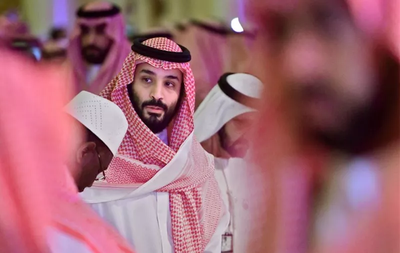 Saudi Crown Prince Mohammed bin Salman arrives at the Future Investment Initiative FII conference in the Saudi capital Riyadh on October 24, 2018. - The summit, nicknamed "Davos in the desert", has been overshadowed by growing global outrage over the murder of a Saudi journalist inside the kingdom's consulate in Istanbul. (Photo by GIUSEPPE CACACE / AFP)
