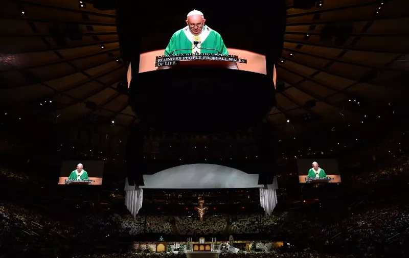 Pope Francis celebrates Mass at  Madison Square Garden on September 25, 2015 in New York City.     AFP PHOTO / VINCENZO PINTO