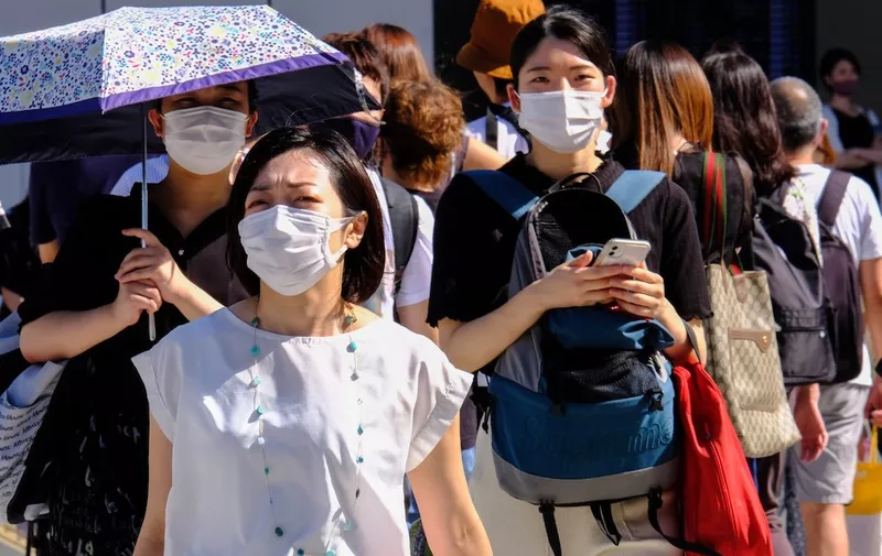 People wearing masks as a preventive measure against the spread of covid-19 cross at Shibuya Crossing in Tokyo.
Tokyo reports record 2,848 new coronavirus cases; nationwide tally 7,629.
Shibuya Crossing in Tokyo, Japan - 16 July 2021,Image: 623780673, License: Rights-managed, Restrictions: , Model Release: no, Credit line: Profimedia