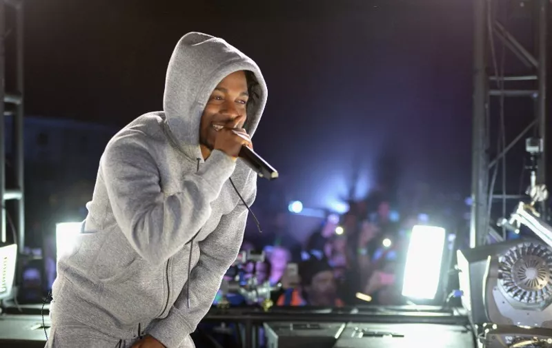 WEST HOLLYWOOD, CA - MARCH 24: Recording artist Kendrick Lamar performs at #GETPUMPED live event. Reebok And Kendrick Lamar Take Over The Streets Of Hollywood, Fusing Fitness And Music With A Ground-Breaking Event on March 24, 2015 in West Hollywood, California.   Chris Weeks/Getty Images for Reebok/AFP
