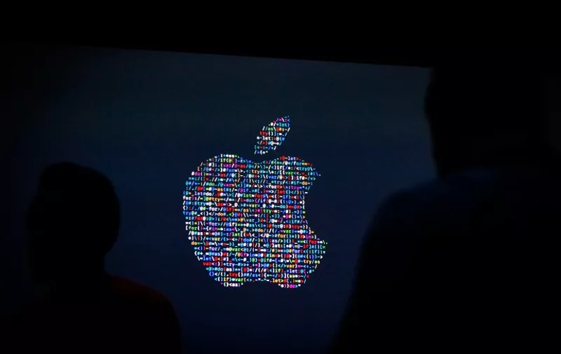 (FILES) This file photo taken on June 13, 2016 shows the Apple logo displayed on a screen at Apple's annual Worldwide Developers Conference presentation at the Bill Graham Civic Auditorium in San Francisco, California.
Apple on August 29, 2016 sent out invitations to a "special event" on September 7 in San Francisco, where it is expected to unveil a new iPhone model. In the company's usual enigmatic style, it provided little more that the date, time and place to the invitation-only gathering set for the Bill Graham Civic Auditorium near San Francisco City Hall.
 / AFP PHOTO / GABRIELLE LURIE