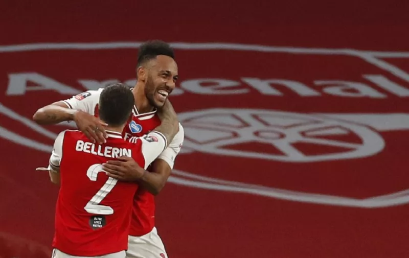 Arsenal's Gabonese striker Pierre-Emerick Aubameyang (R) celebrates scoring their second goal  during the English FA Cup semi-final football match between Arsenal and Manchester City at Wembley Stadium in London, on July 18, 2020. (Photo by MATTHEW CHILDS / POOL / AFP) / NOT FOR MARKETING OR ADVERTISING USE / RESTRICTED TO EDITORIAL USE