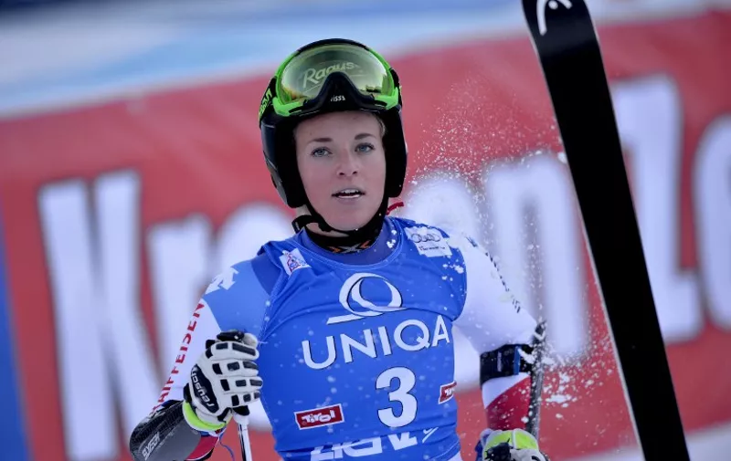 Lara Gut of Switzerland celebrates her first place in finish area of the Women FIS Alpine skiing World cup giant slalom in Lienz, Austria on December 28, 2015.
  / AFP / SAMUEL KUBANI
