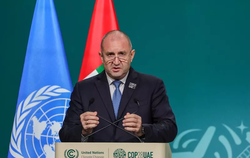Bulgaria's President Rumen Radev speaks during the High-Level Segment for Heads of State and Government session at the United Nations climate summit in Dubai on December 2, 2023. The COP28 conference opened on December 1 with an early victory as nations agreed to launch a "loss and damage" fund for vulnerable countries devastated by natural disasters. (Photo by Giuseppe CACACE / AFP)