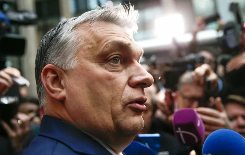 Hungary's Prime Minister Viktor Orban leaves following a meeting during the second day of a special European Council summit in Brussels on February 21, 2020 held to discuss the next long-term budget of the European Union (EU). (Photo by Aris Oikonomou / AFP)