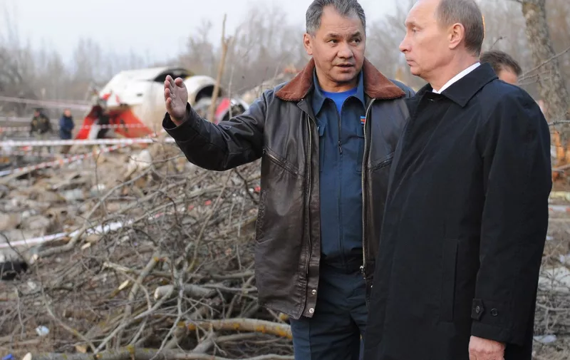 05: SMOLENSK REGION, RUSSIA. APRIL 11, 2010. Emergency Situations Minister of Russia Sergei Shoigu, Russian Prime Minister Vladimir Putin (L-R) inspect the site of the Polish President’s plane crash in the Smolensk Region. Poland's President Lech Kaczynski and his wife Maria, its central bank head and the country's military chief, were among 97 people killed when their plane crashed in thick fog on its approach to Smolensk airport, in western Russia.,Image: 56513489, License: Rights-managed, Restrictions: , Model Release: no