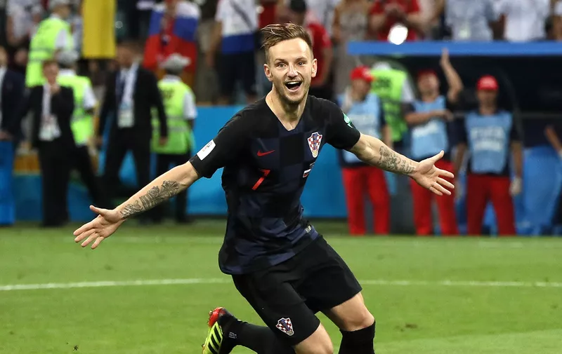 SOCHI, RUSSIA - JULY 07:  Ivan Rakitic of Croatia celebrates scoring his team's fifth penalty, the winning penalty, in the penalty shoot out during the 2018 FIFA World Cup Russia Quarter Final match between Russia and Croatia at Fisht Stadium on July 7, 2018 in Sochi, Russia.  (Photo by Kevin C. Cox/Getty Images)